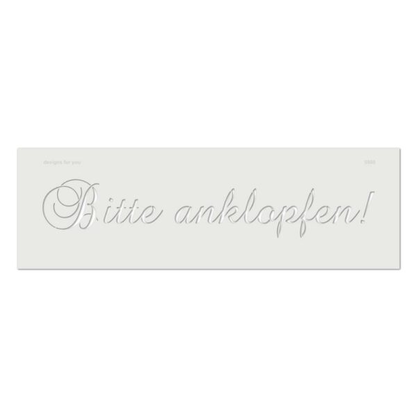 Auf weißem Untergrund liegt die Schablone Bitte anklopfen.
